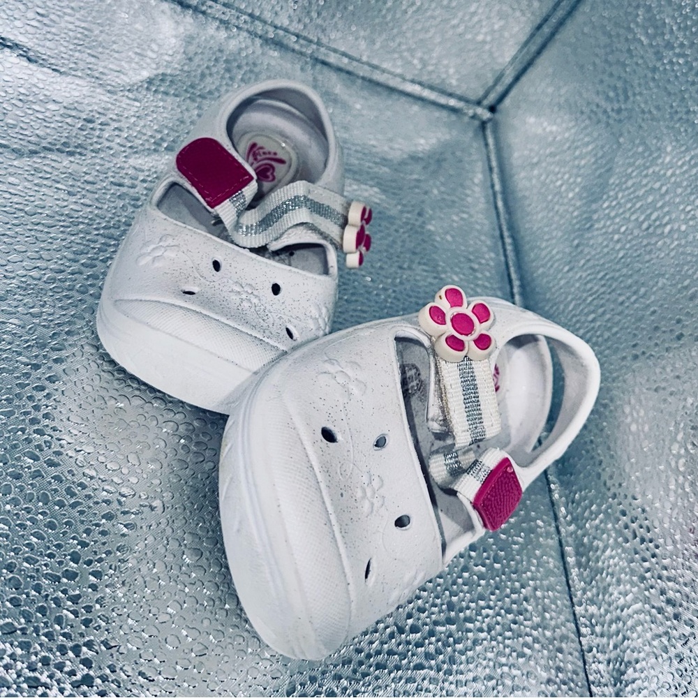 White and Pink Shoes by Place